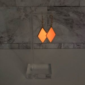 Orange Glow-In-The-Dark Earrings. Resin in a golden diamond drop.
